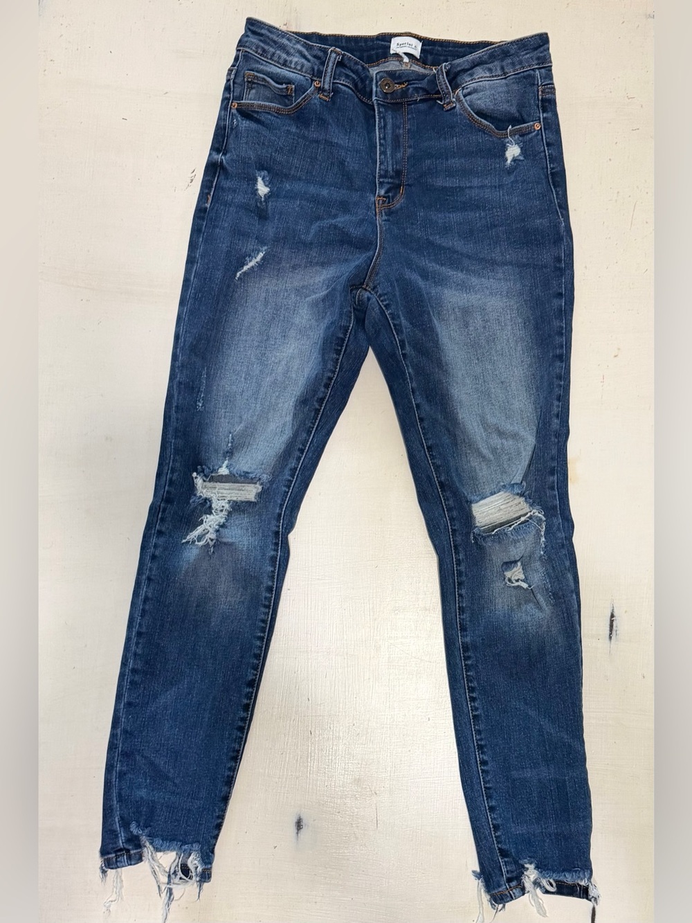 Women's Skinny Distressed Jeans in Dark Blue Wash